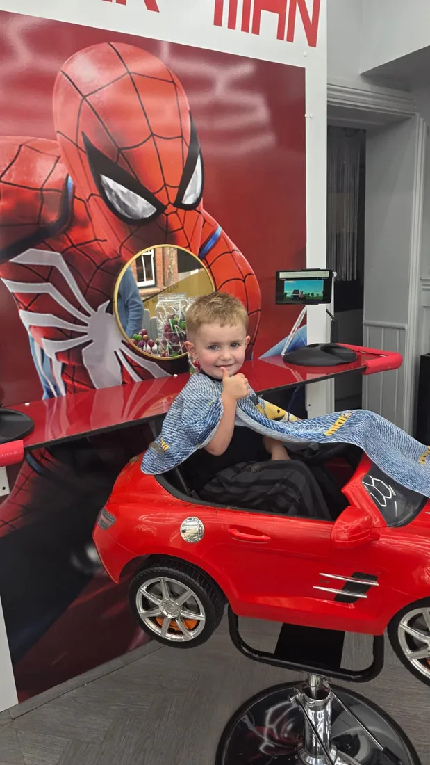 Thumbs up after a kids haircut